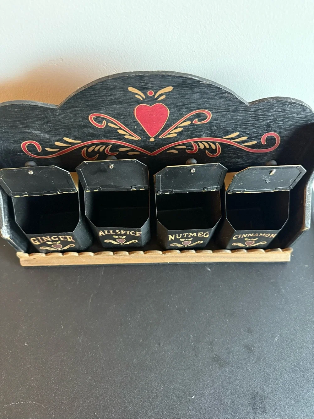 Vintage Folkart tin spice containers with wooden shelf